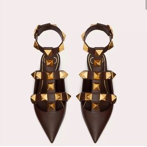 NEW IN BOX Valentino rock stud flats. Never worn. Comes with box, duster, card